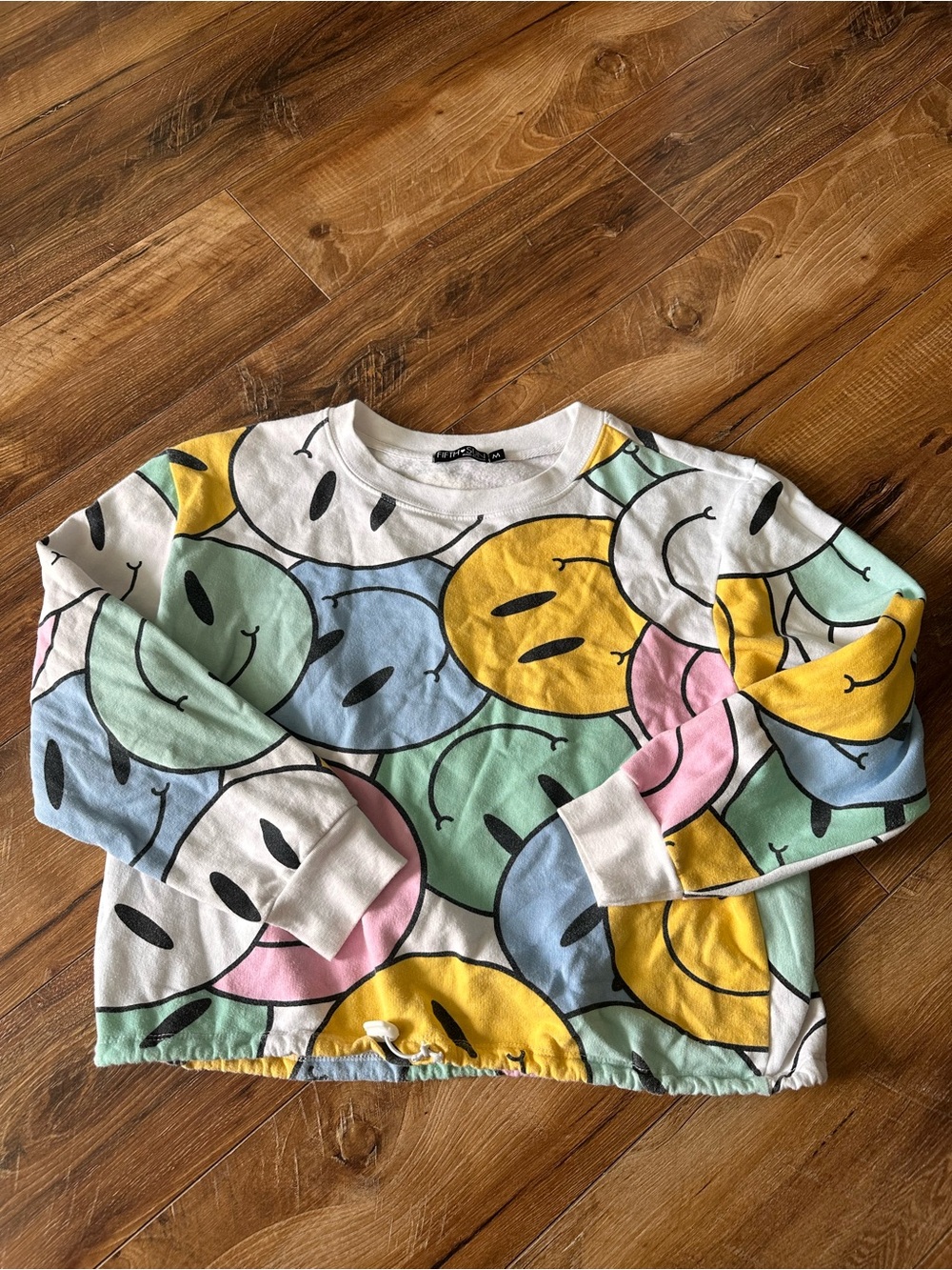 Medium happy face sweater